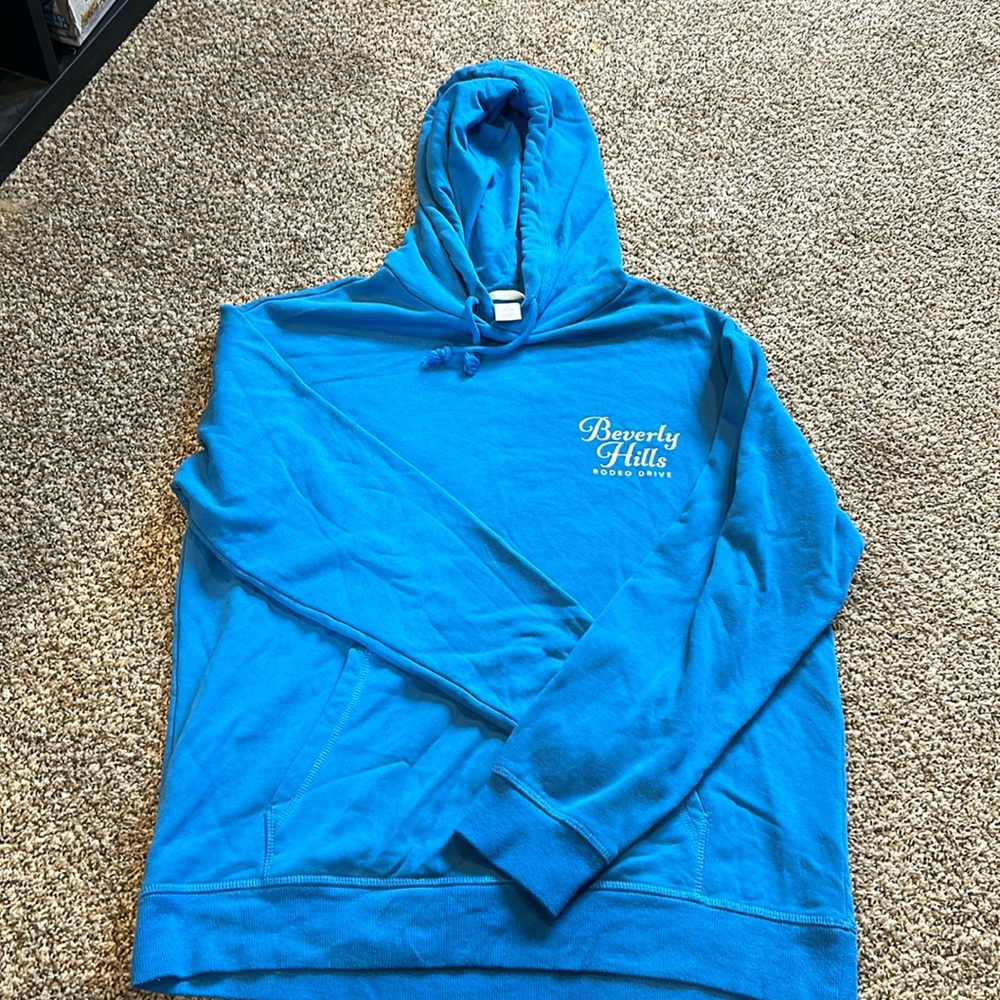 H&M blue hooded sweatshirt with Rodeo Drive.